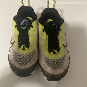 Kids Black and Yellow Nike Shoes